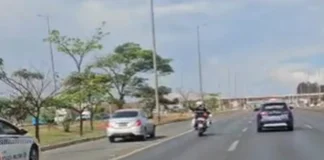Viatura descaracterizada da PCDF ultrapassa comboio de escolta da PMDF na EPTG